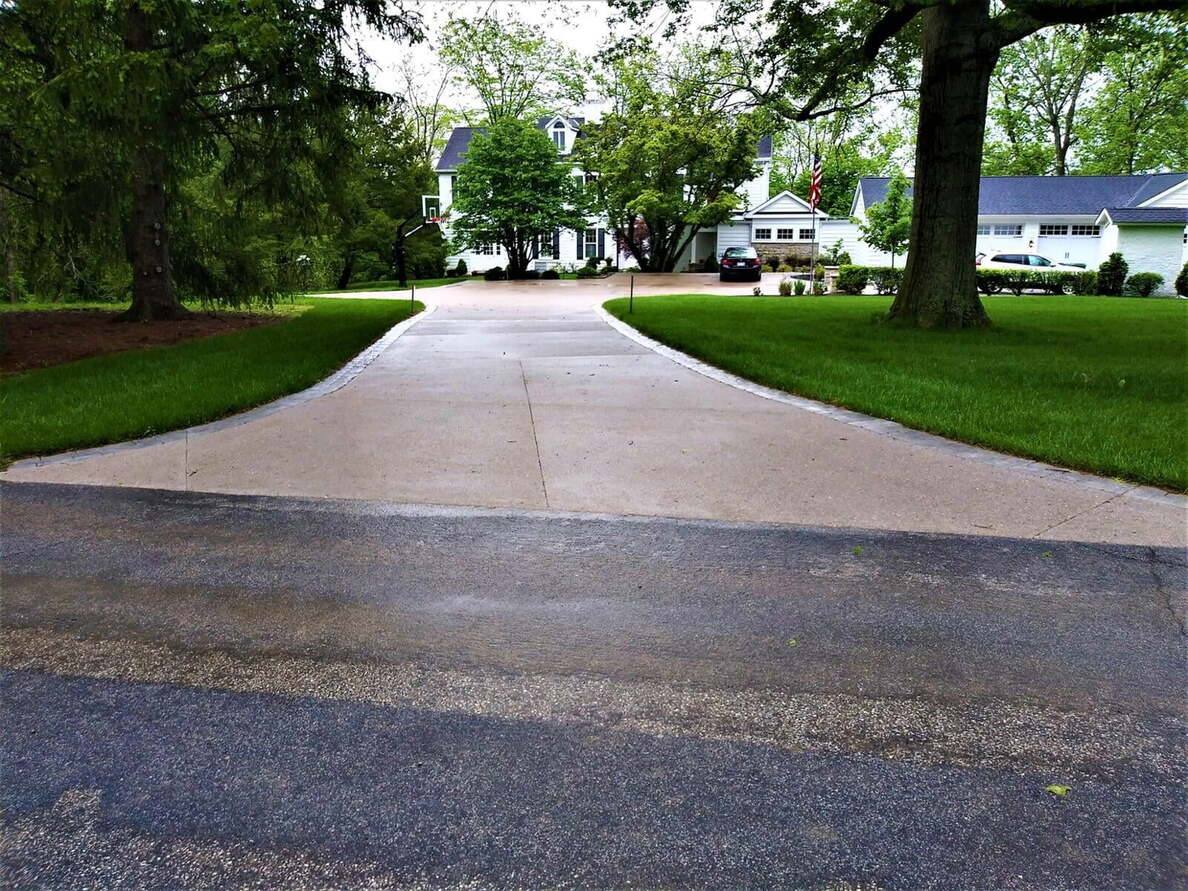 Exposed Aggregate with Cobblestone Borders 7